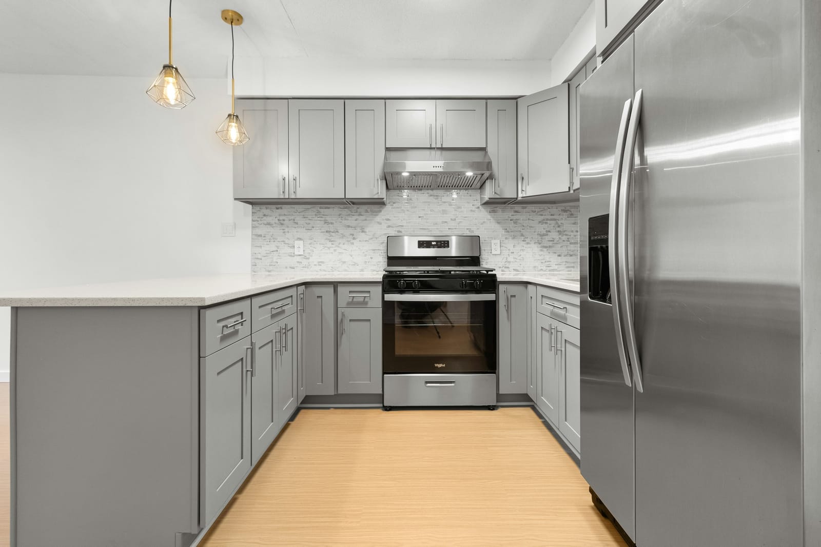 Australian kitchen with stainless-steel appliances and white walls